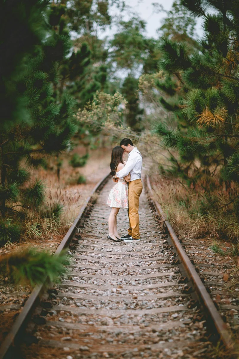 Couple shoot on train tracks