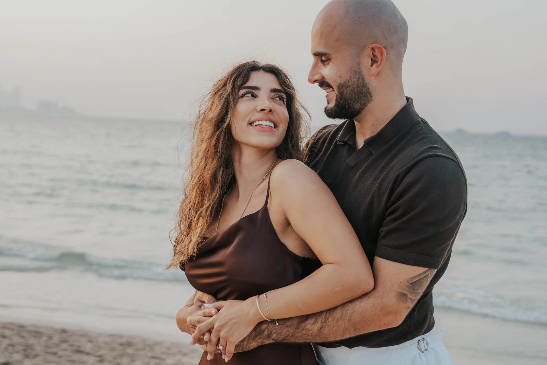 Photo of couple during their engagement photoshoot Photo of couple during their engagement photoshoot