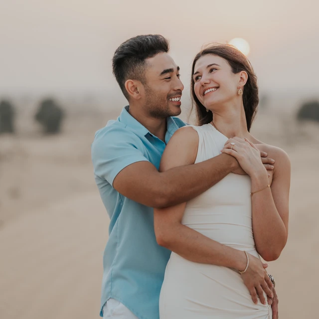 Photo of couple during their engagement photoshoot Photo of couple during their engagement photoshoot