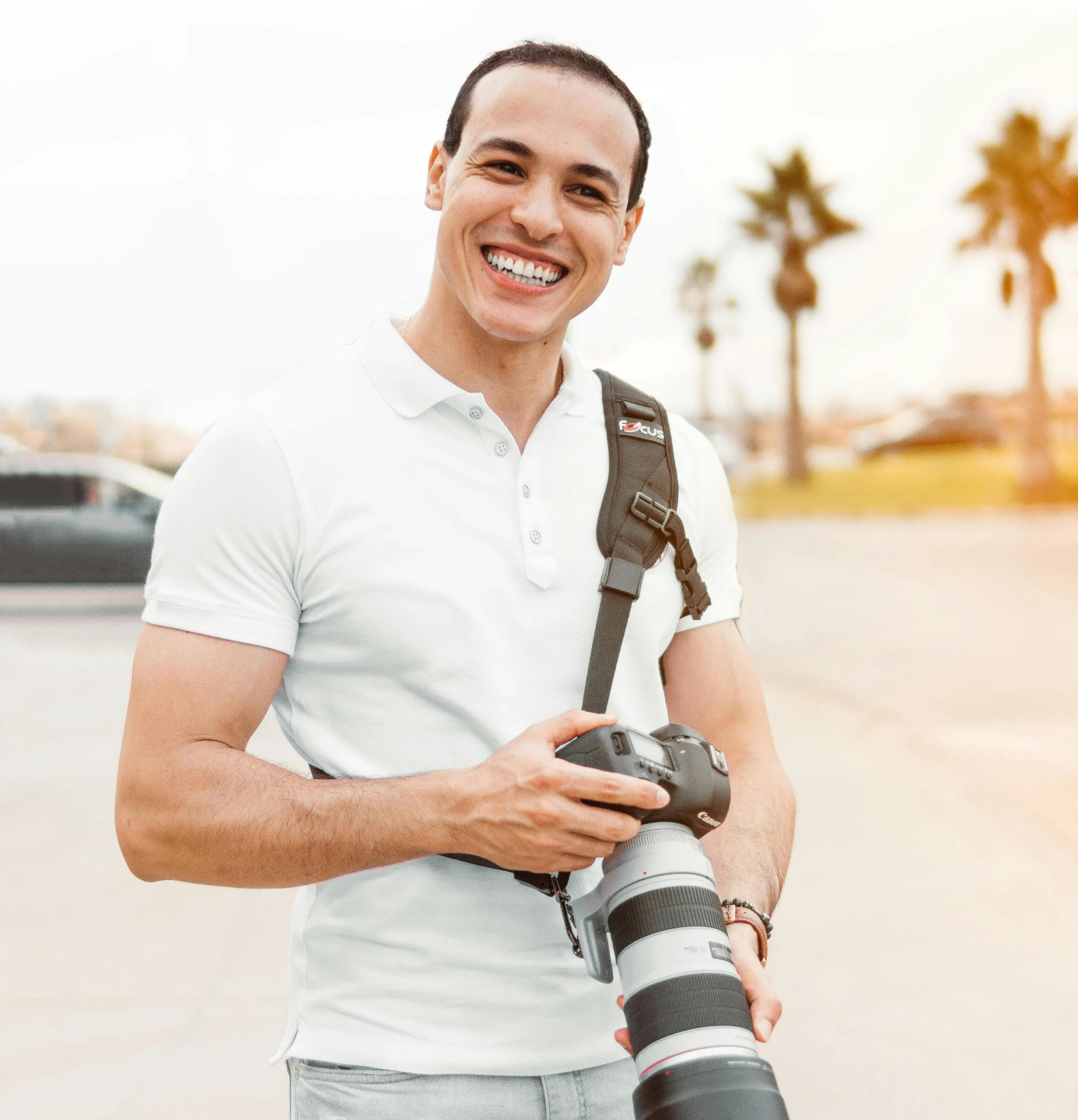 Choose your photographer Photo of photographer with his viewfinder as subject with a woman in view